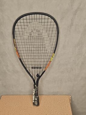 HEAD Racquetball Racquet in Black with Orange Accents